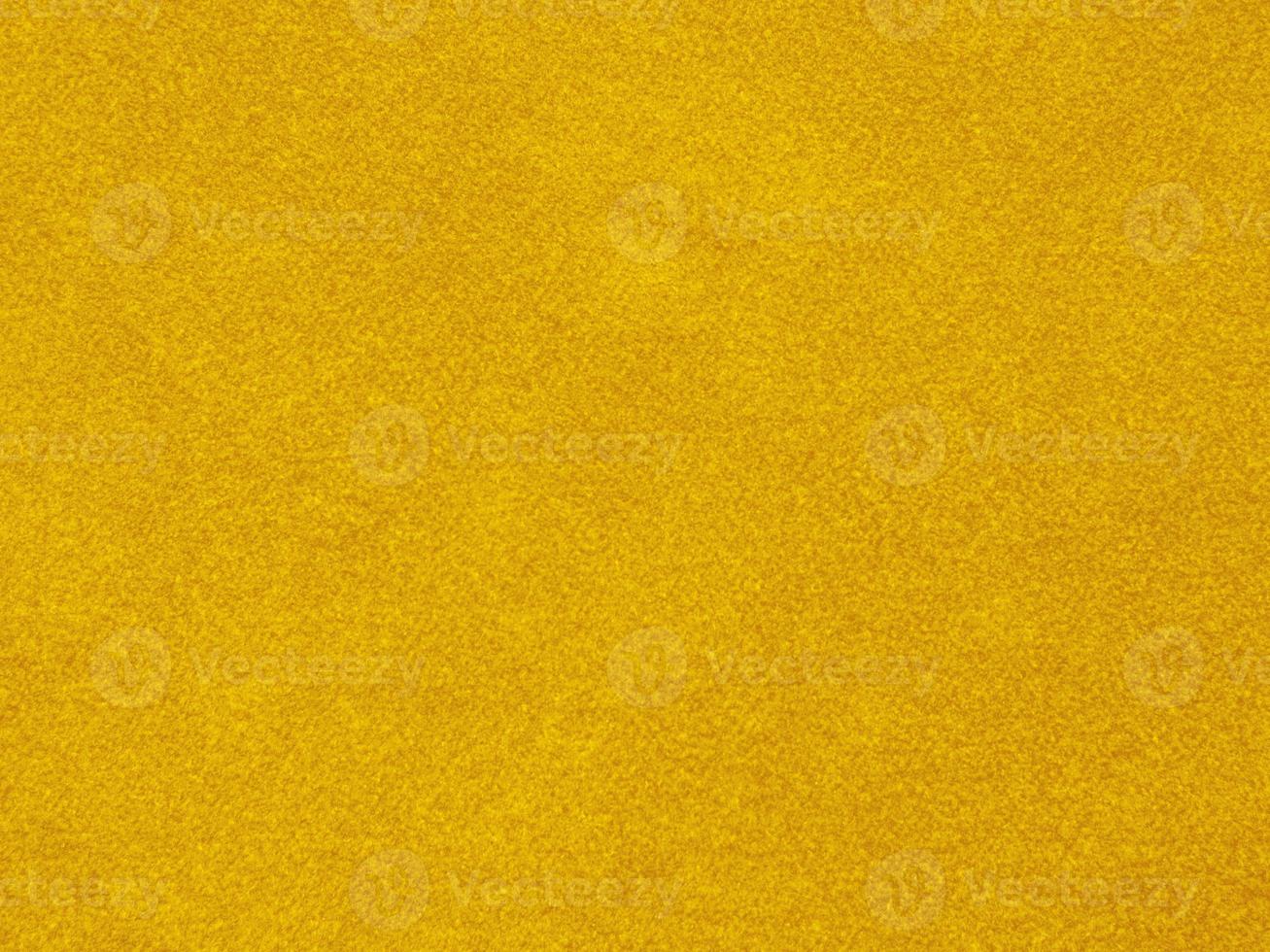 gul sammet tyg textur Begagnade som bakgrund. tömma gul tyg bakgrund av mjuk och slät textil- material. där är Plats för text foto