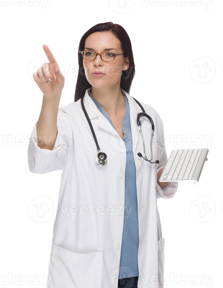 kvinna läkare eller sjuksköterska tryckande knapp eller pekande, kopia rum foto
