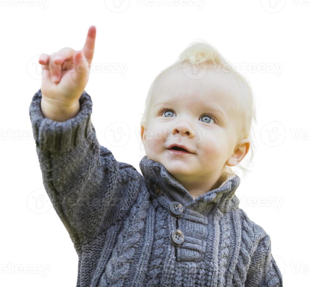 söt liten pojke i Tröja pekande på vit foto