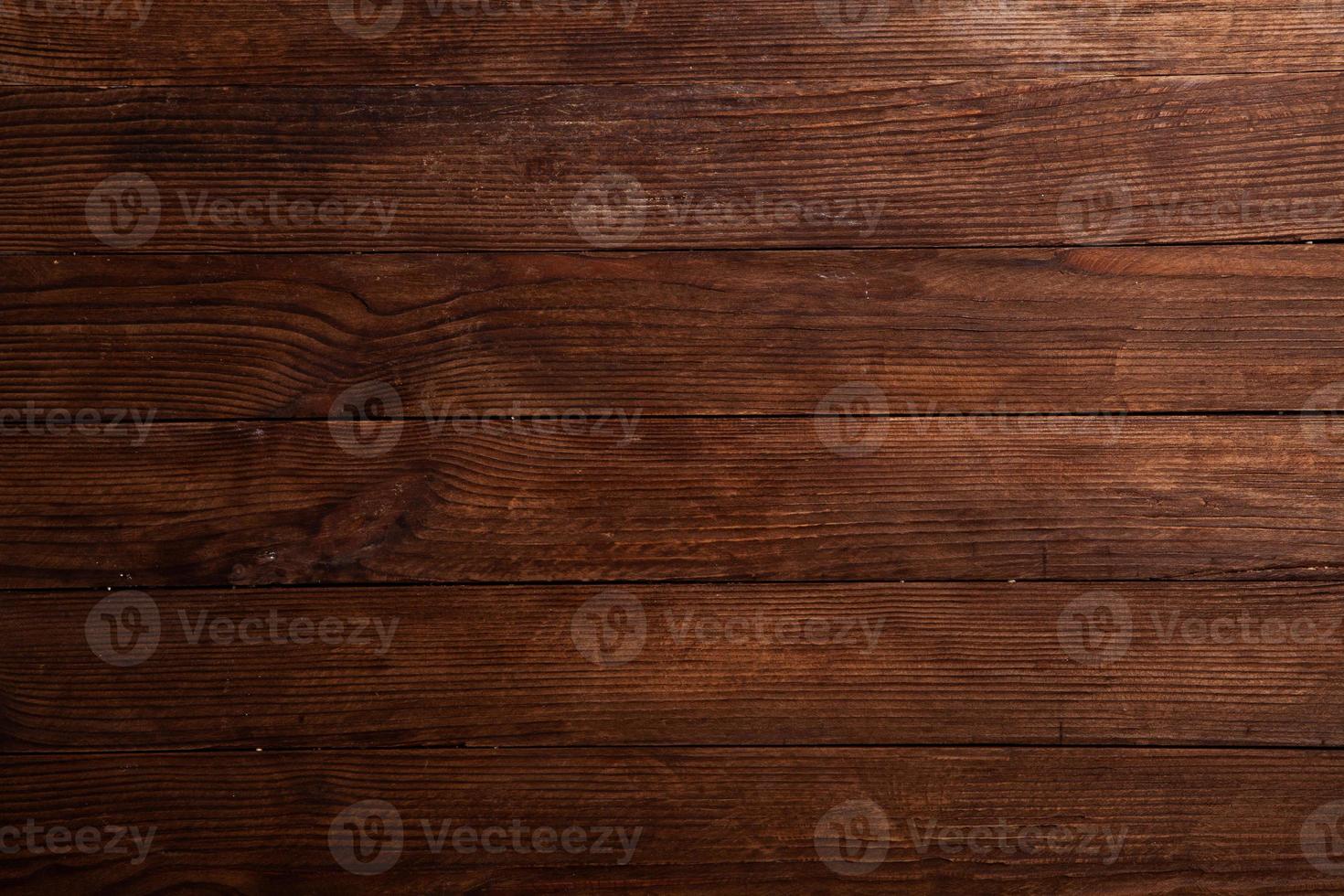 årgång brun trä bakgrund textur med knop och nagel hål. gammal målad trä vägg. brun abstrakt bakgrund. årgång trä- mörk horisontell brädor. foto
