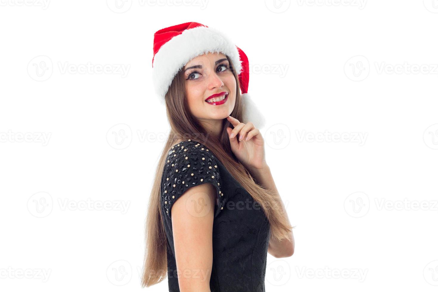 flicka i santa hatt leende foto