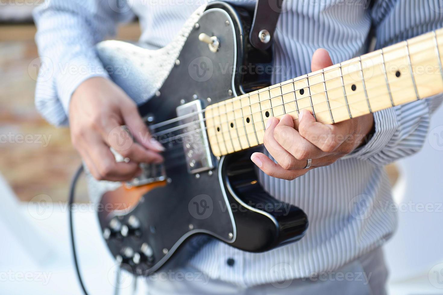 gitarrist eller en gitarr spelare foto