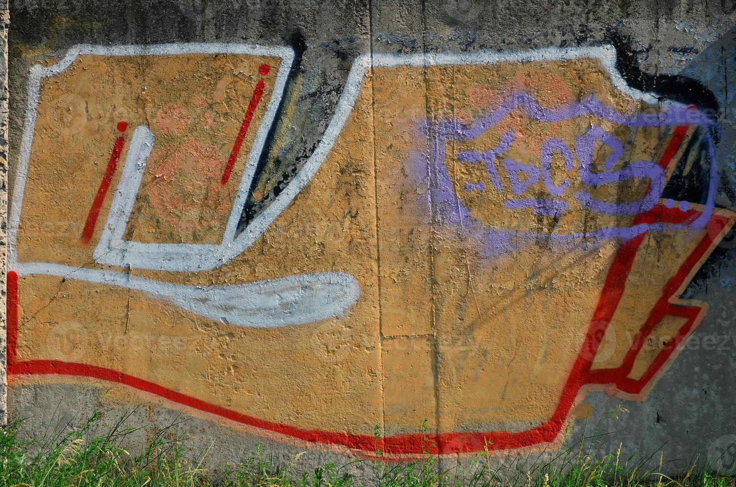 gata konst. färgrik graffiti på de vägg. fragment för bakgrund. abstrakt detalj av en graffiti foto