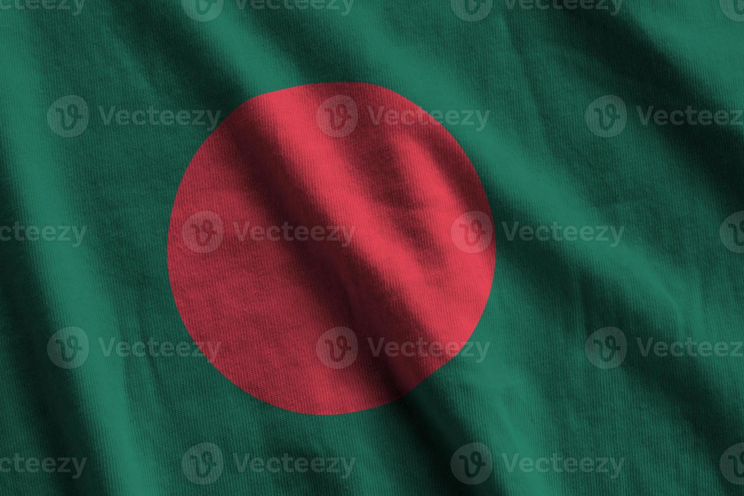 bangladesh flagga med stor veck vinka stänga upp under de studio ljus inomhus. de officiell symboler och färger i baner foto