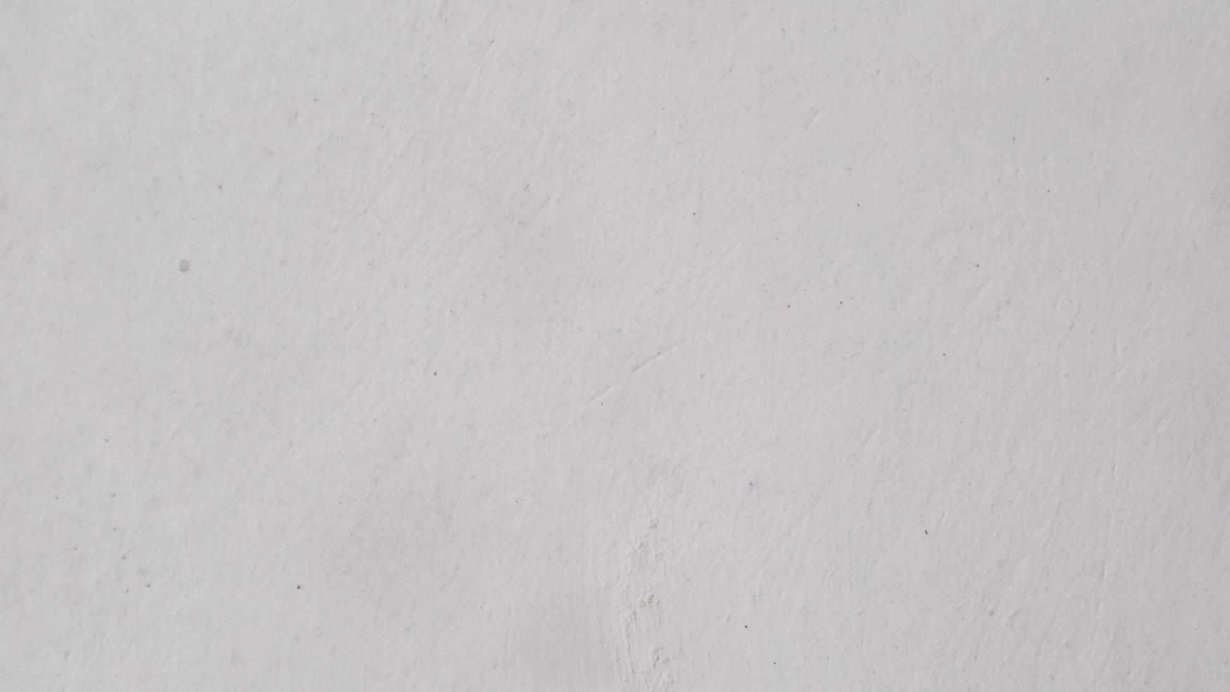 textur av betong vägg med vit måla som bakgrund foto