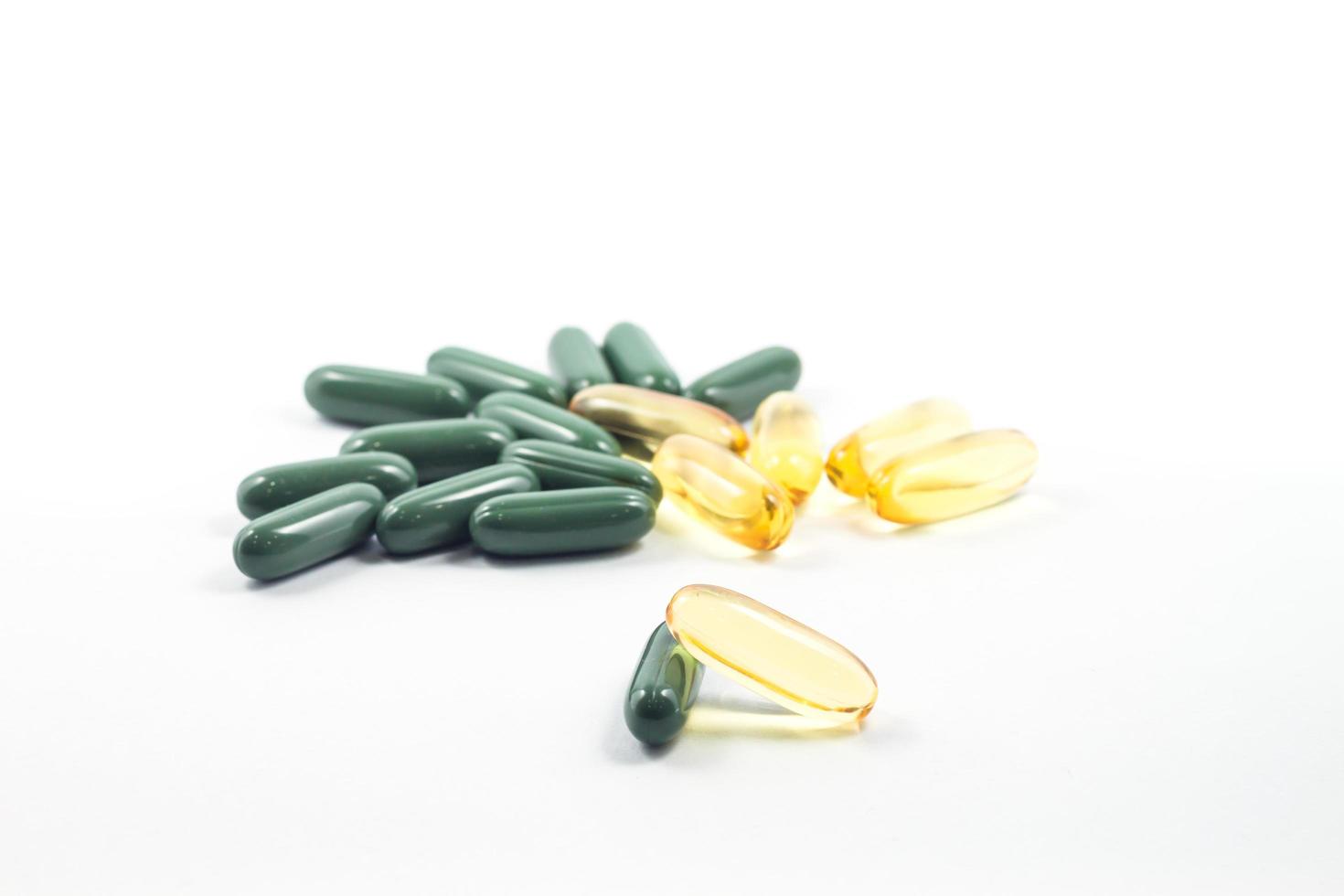 gröna och gula piller foto