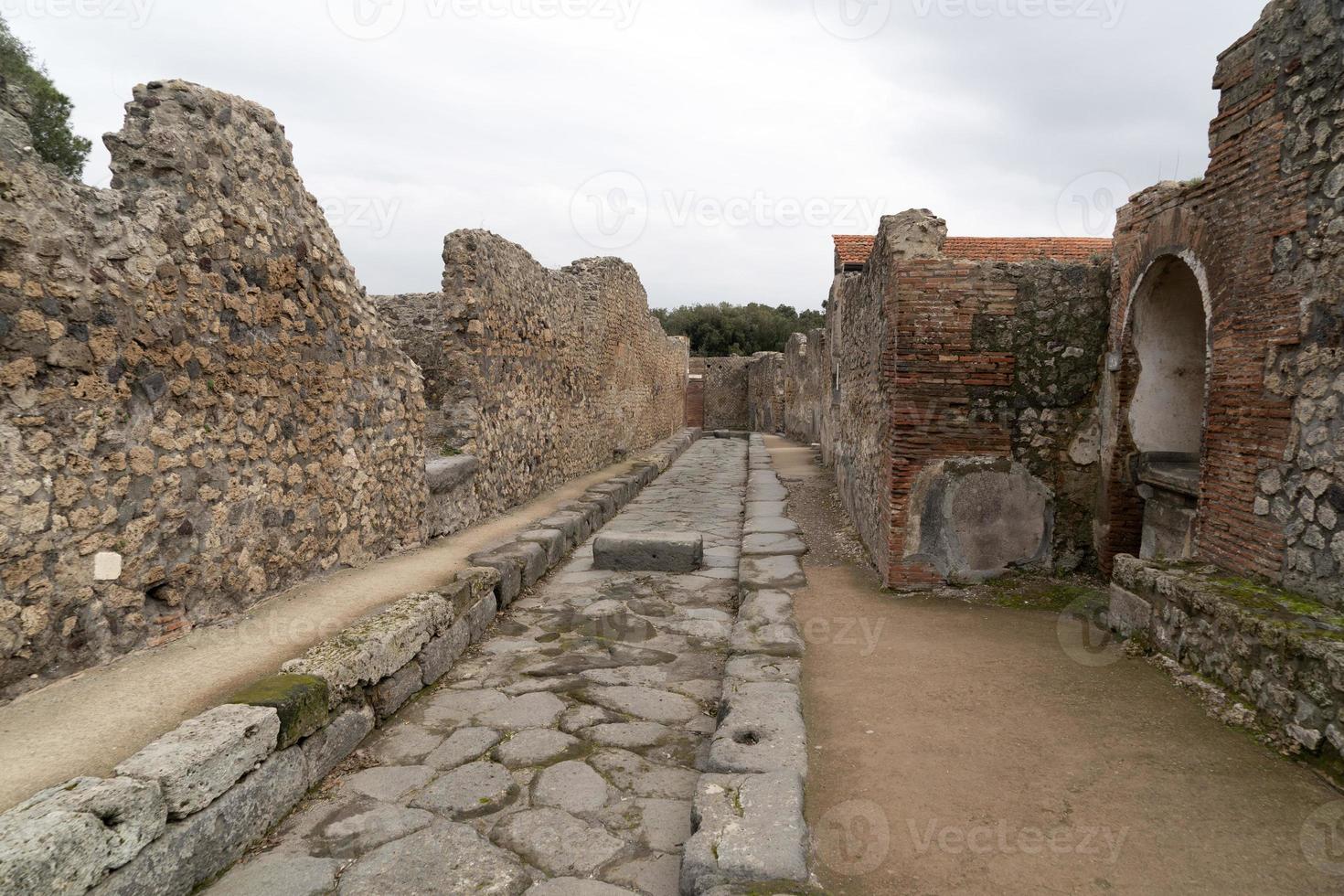 pompei ruiner roman väg gata fotgängare promenad foto
