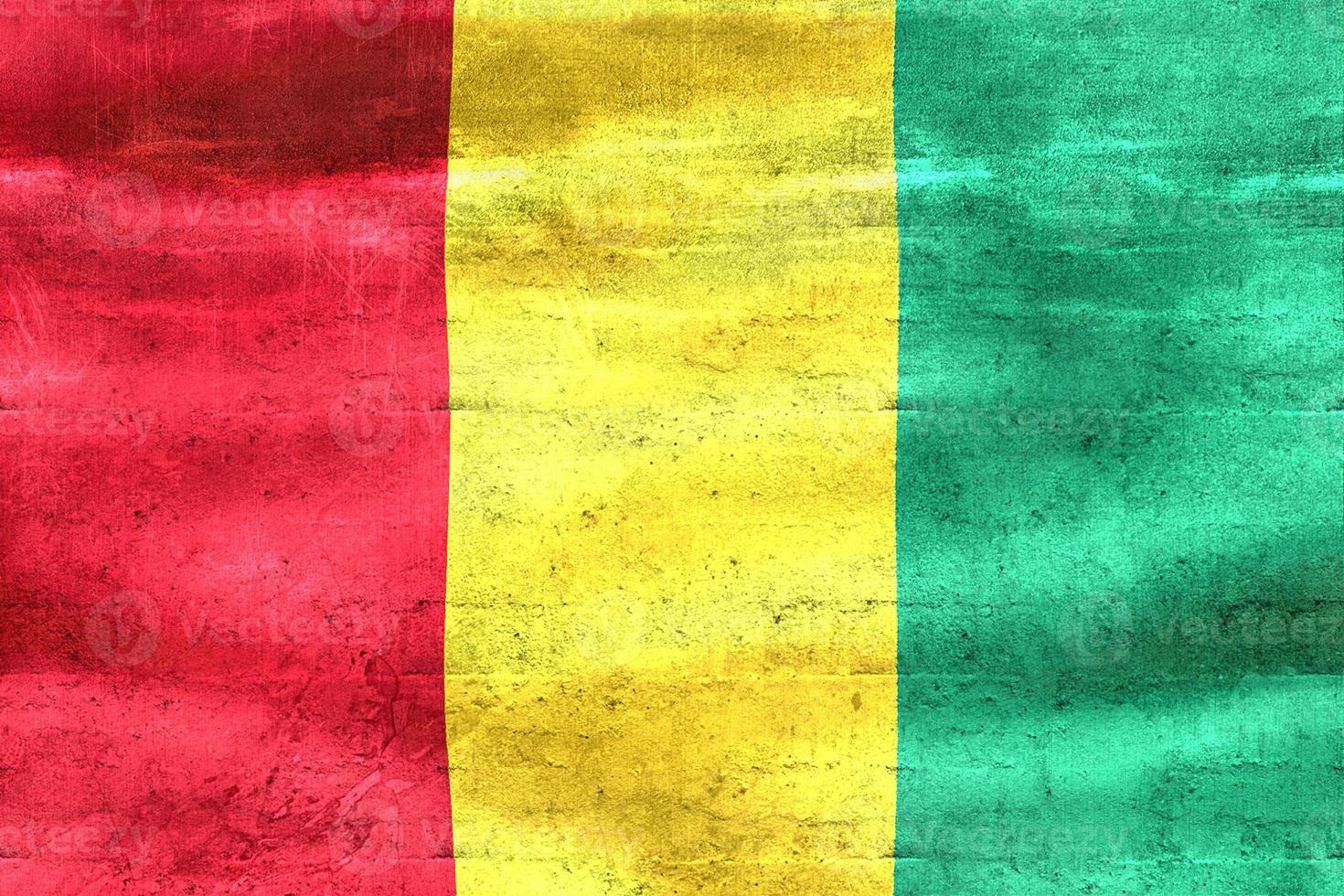 Guinea flagga - realistiskt viftande tygflagga foto