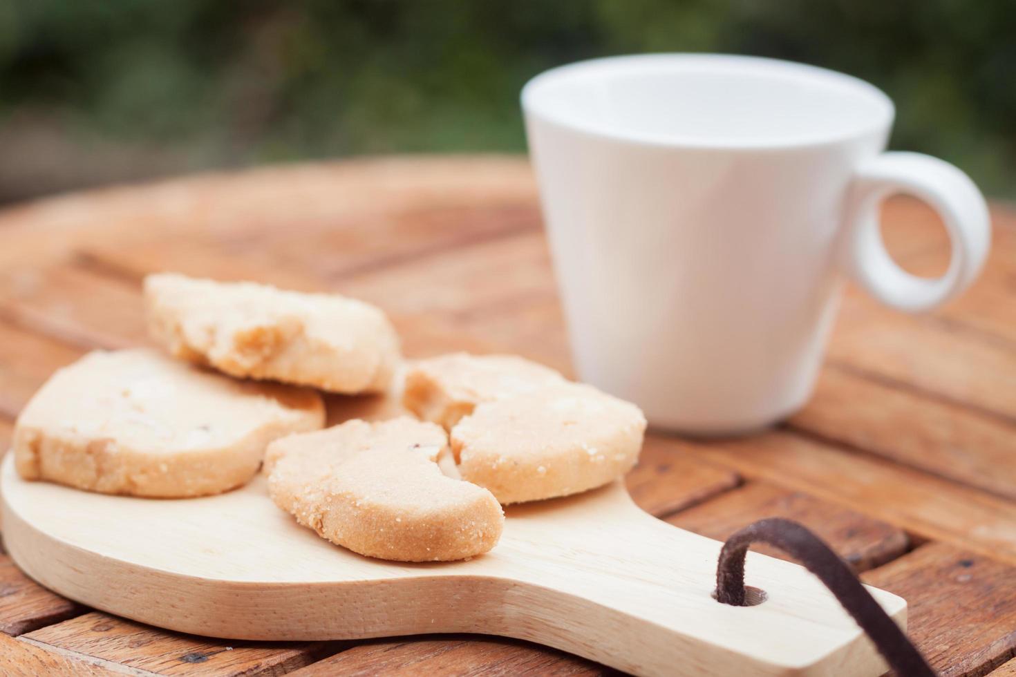 kakor med en kaffekopp foto