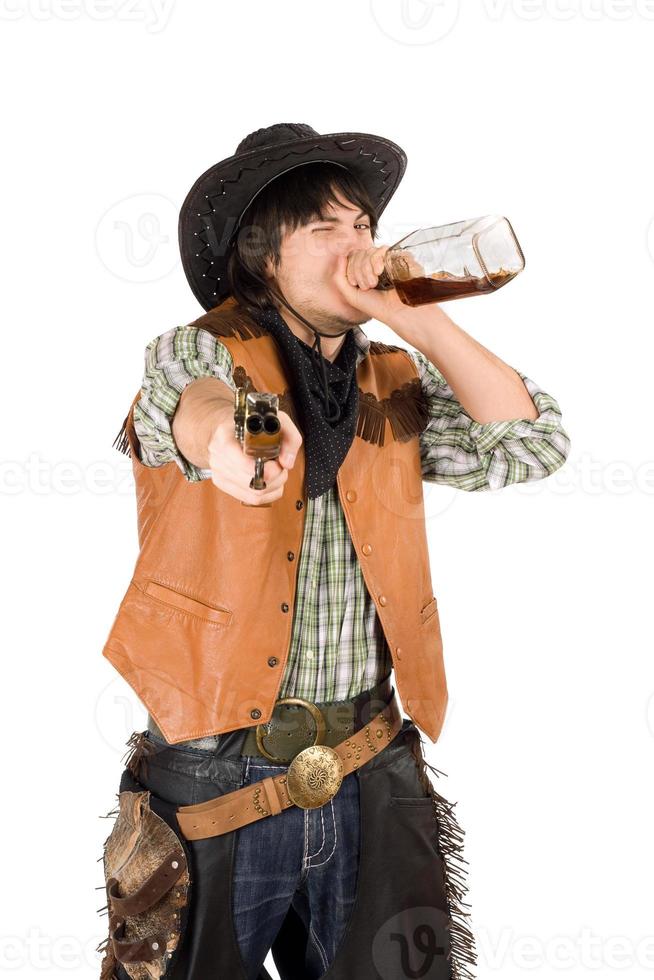 cowboy dricka whisky från de flaska foto