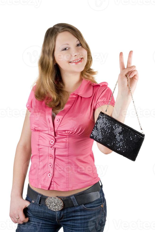 skön leende ung kvinna med en handväska. isolerat foto