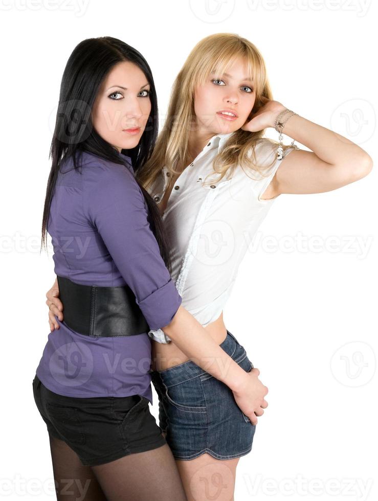 porträtt av de två sexig ung flickvänner. isolerat foto
