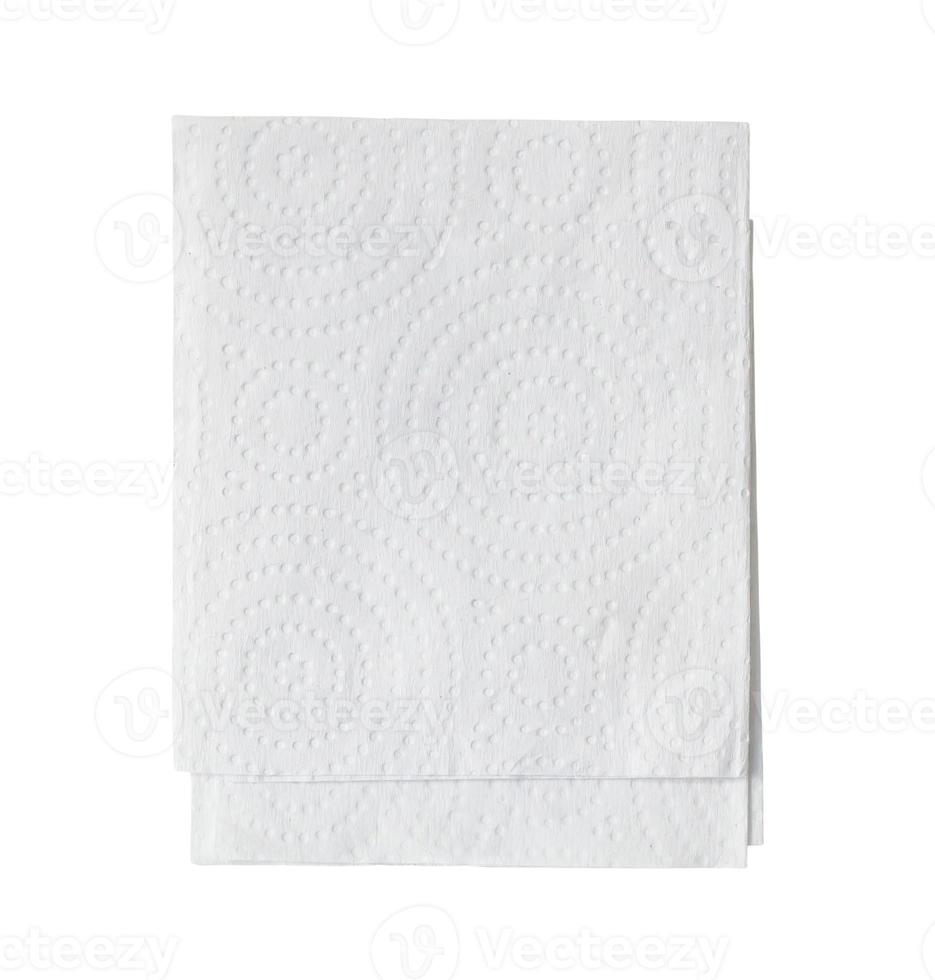 två vikta bitar av vit vävnad papper eller servett i stack snyggt beredd för använda sig av i toalett eller toalett isolerat på vit bakgrund med klippning väg foto