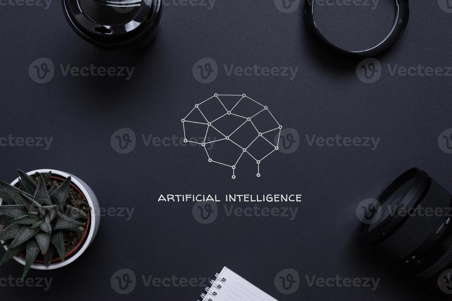 teckning av en hjärna från nätverk knutpunkter och artificiell intelligens text på en skrivbord, omgiven förbi kontor förnödenheter, topp se, platt lägga. begrepp av applicering ai i företag foto