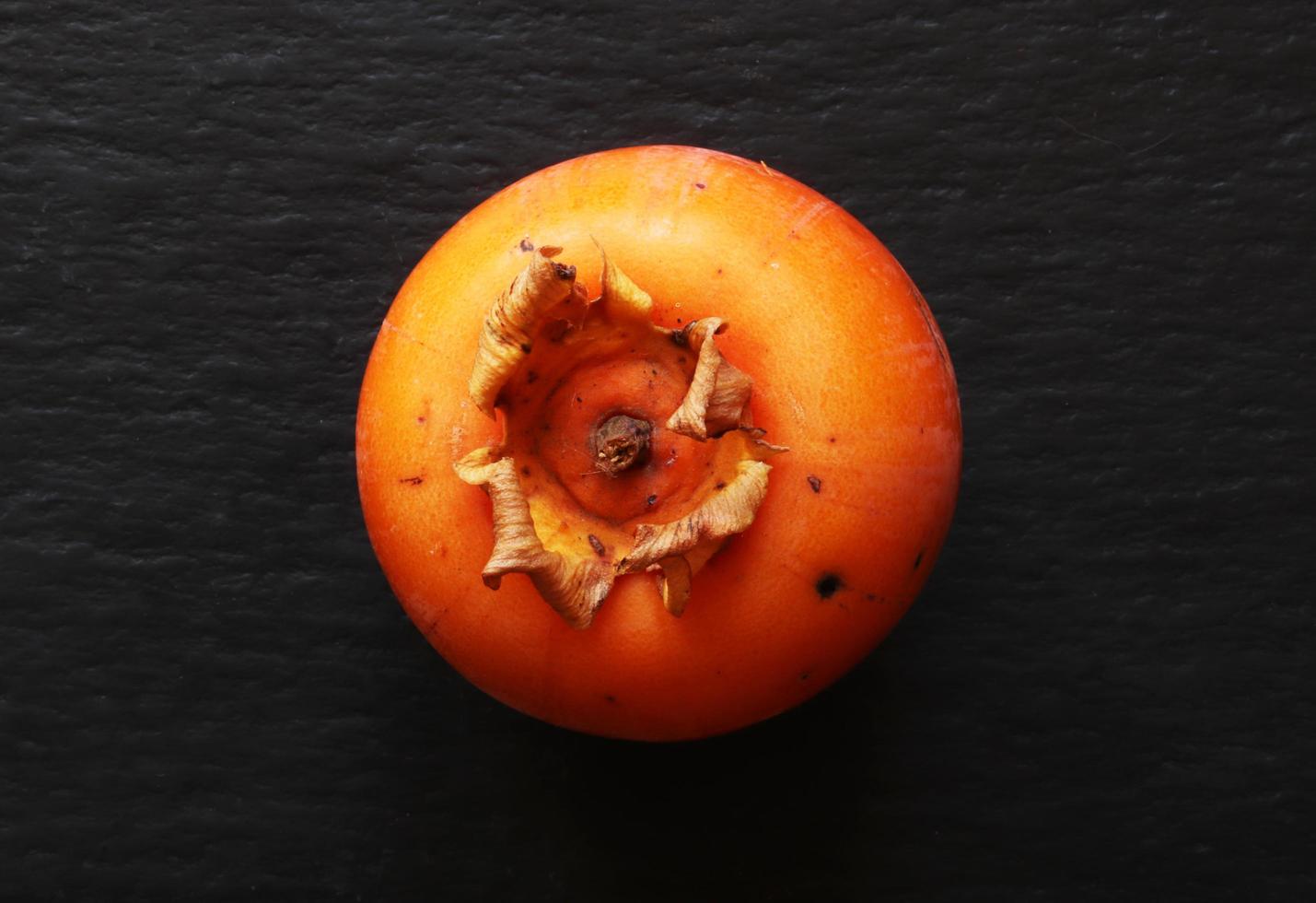 närbild av en persimmon foto