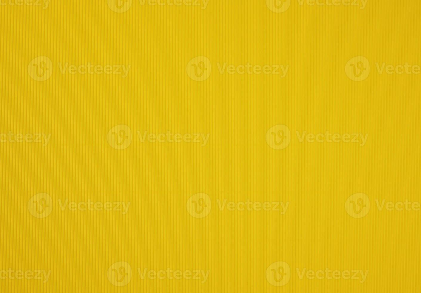 korrugerad kartong gul Färg, abstrakt bakgrund för designer foto