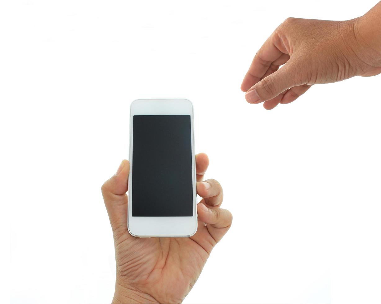 hand som håller telefonen på vit bakgrund foto