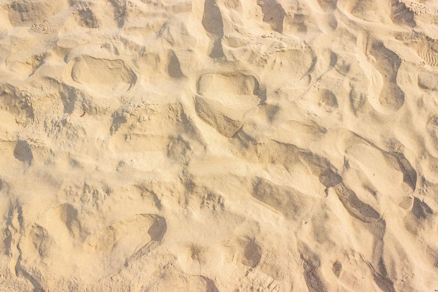 sand på stranden för textur eller bakgrund foto