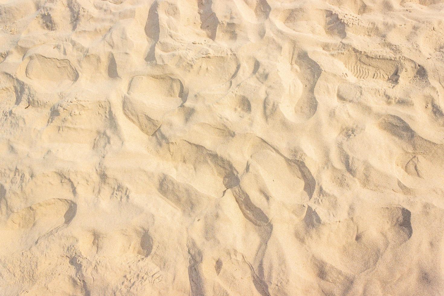 sand på stranden för textur eller bakgrund foto