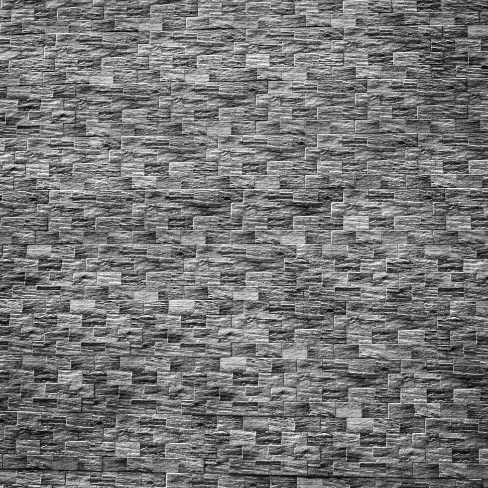 svart och vit tegel vägg bakgrund och textur foto