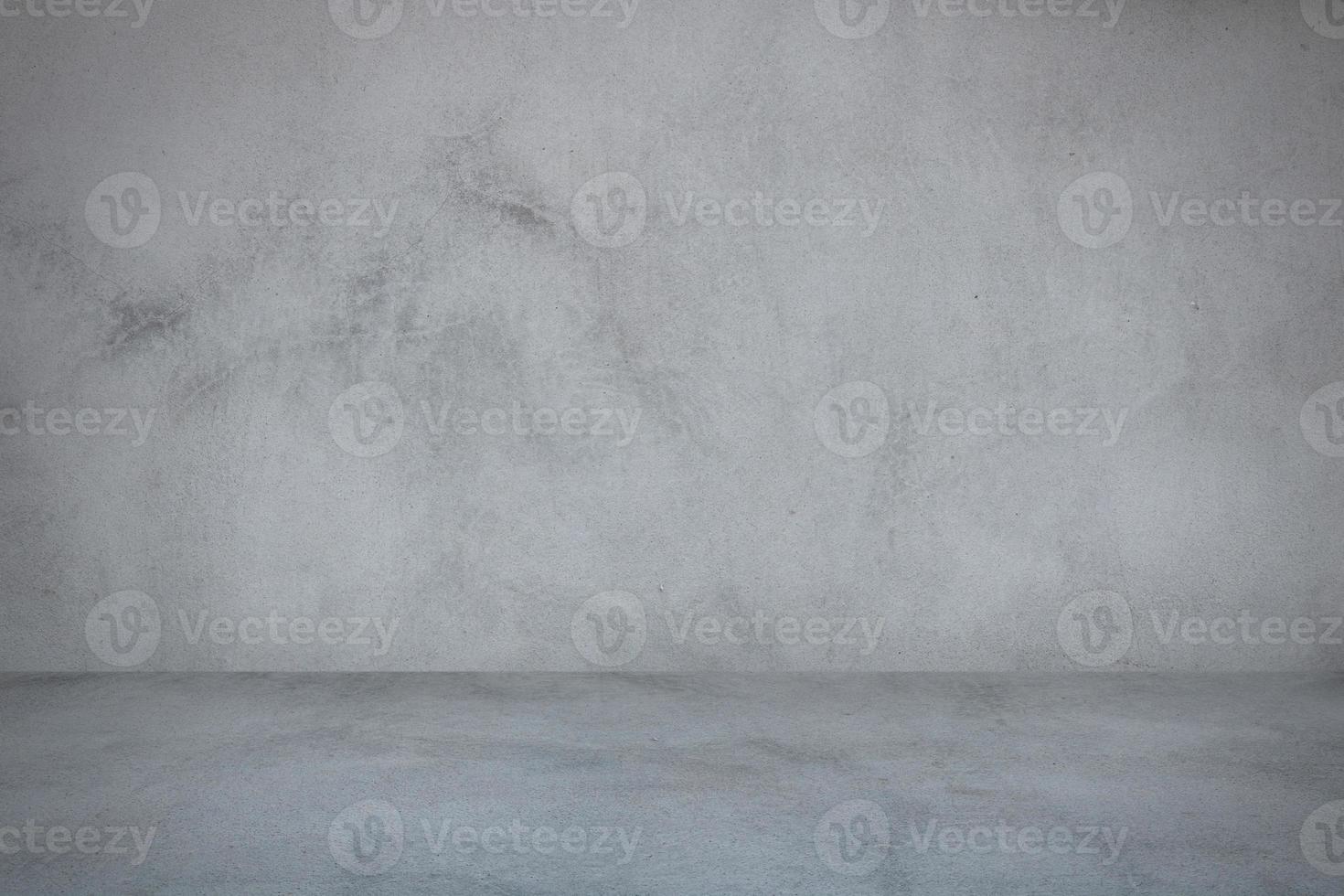 grå cementvägg och studiorumsbakgrund foto