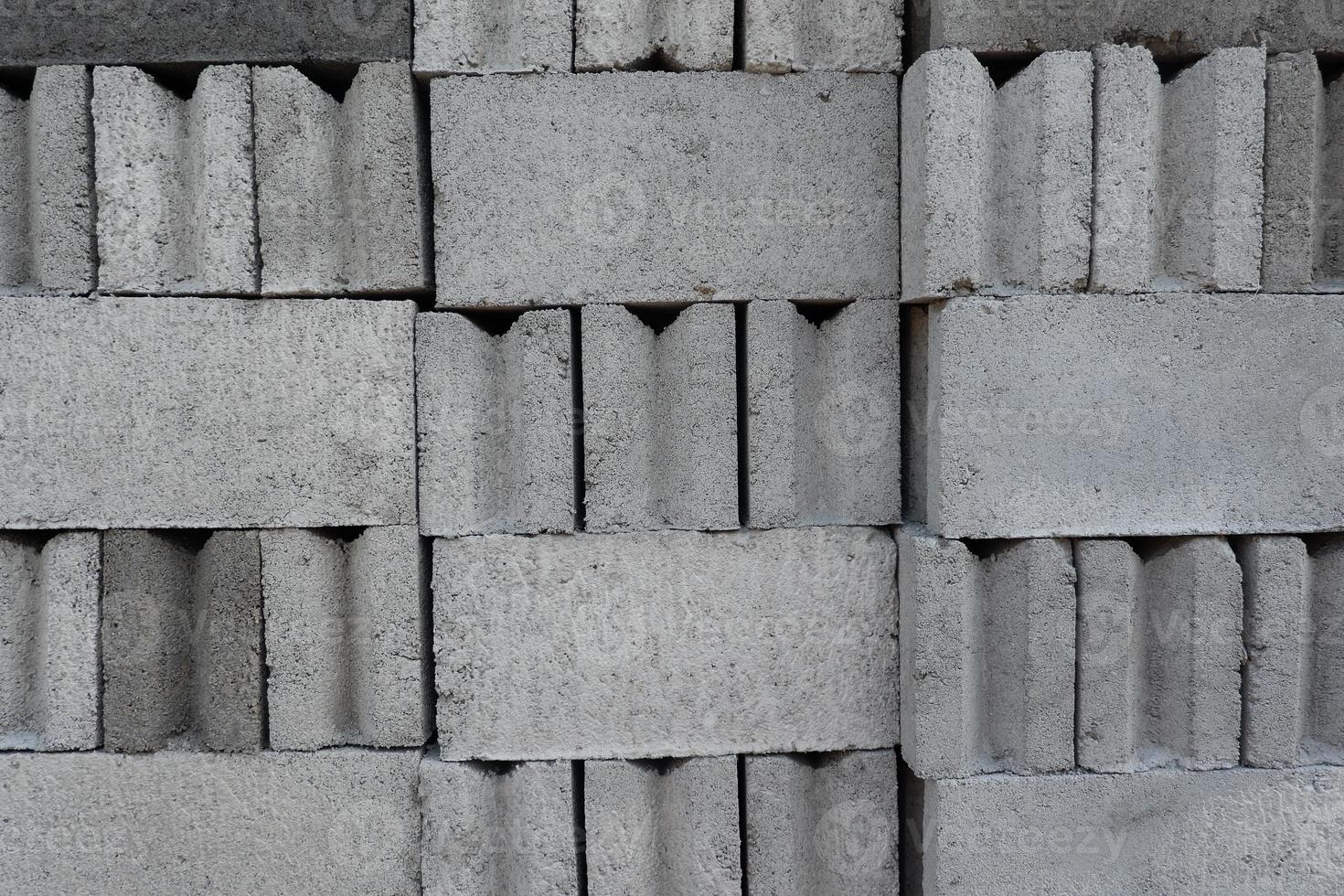 betong tegel tillverkad av cement och sand, tegel textur foto