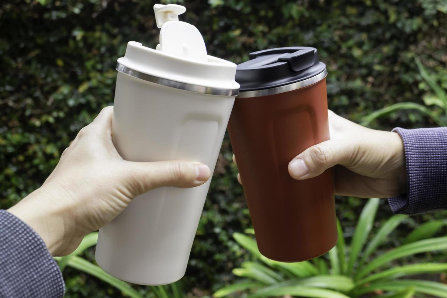 personliga termoser med kaffe foto