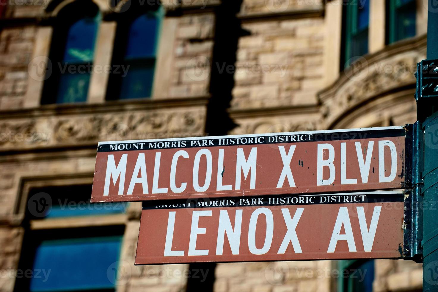 ny york malcom x blbd lenox aveny gata tecken i harlem foto