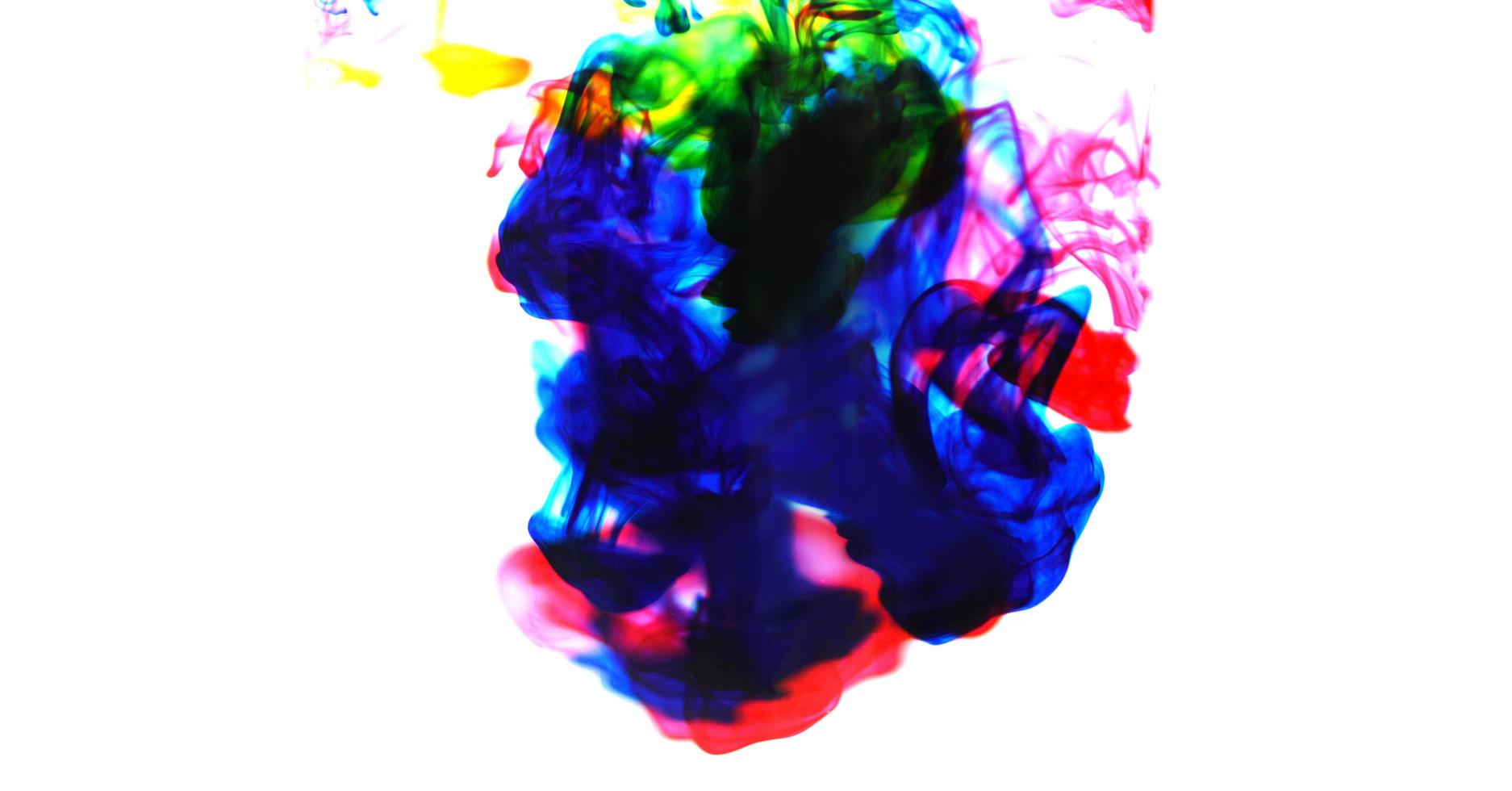 cmyk bläck begrepp Färg stänk för måla - regnbåge bläck släppa akryl färger i vatten på vit bakgrund , fläck och selektiv fokus foto