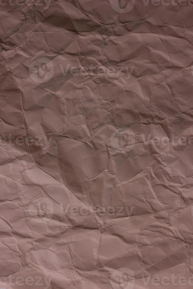 brun skrynklig pappersbakgrundsstruktur foto