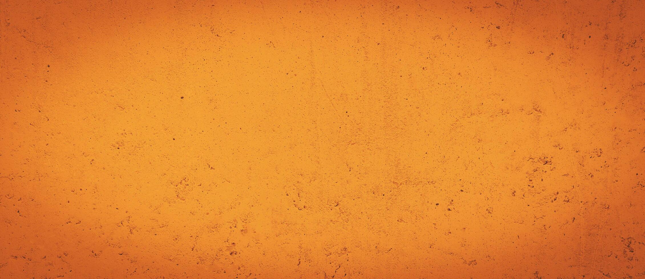 grunge orange vägg betong vägg för interiörer textur bakgrund. foto