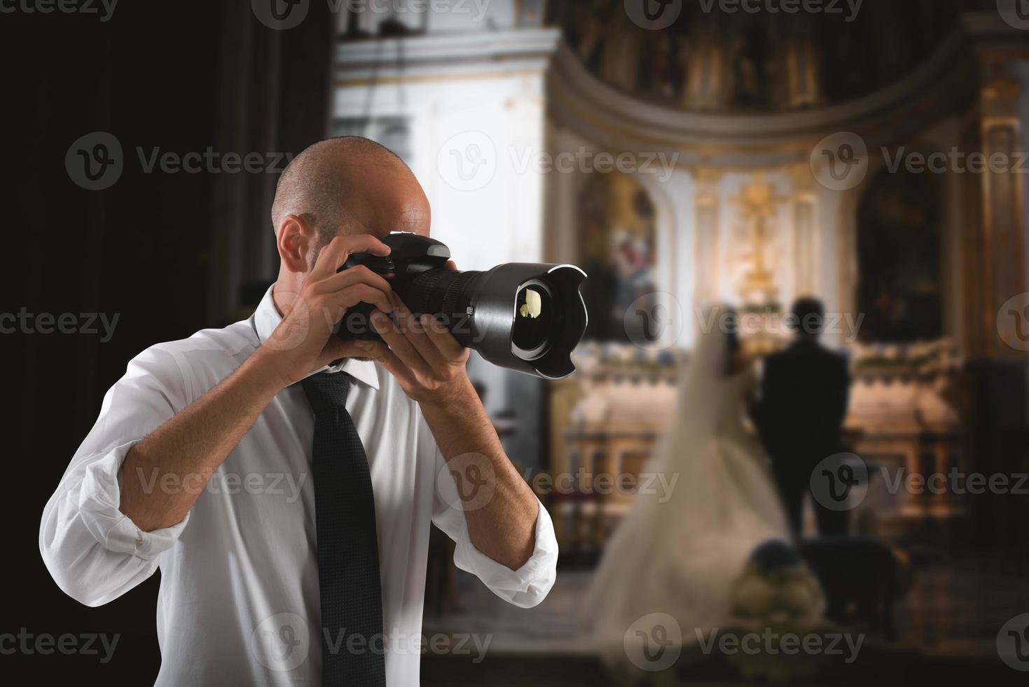 professionell fotograf i en bröllop foto