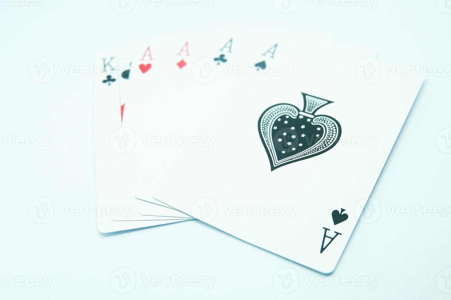 fyra av en snäll med fyra ess och en kung i poker foto