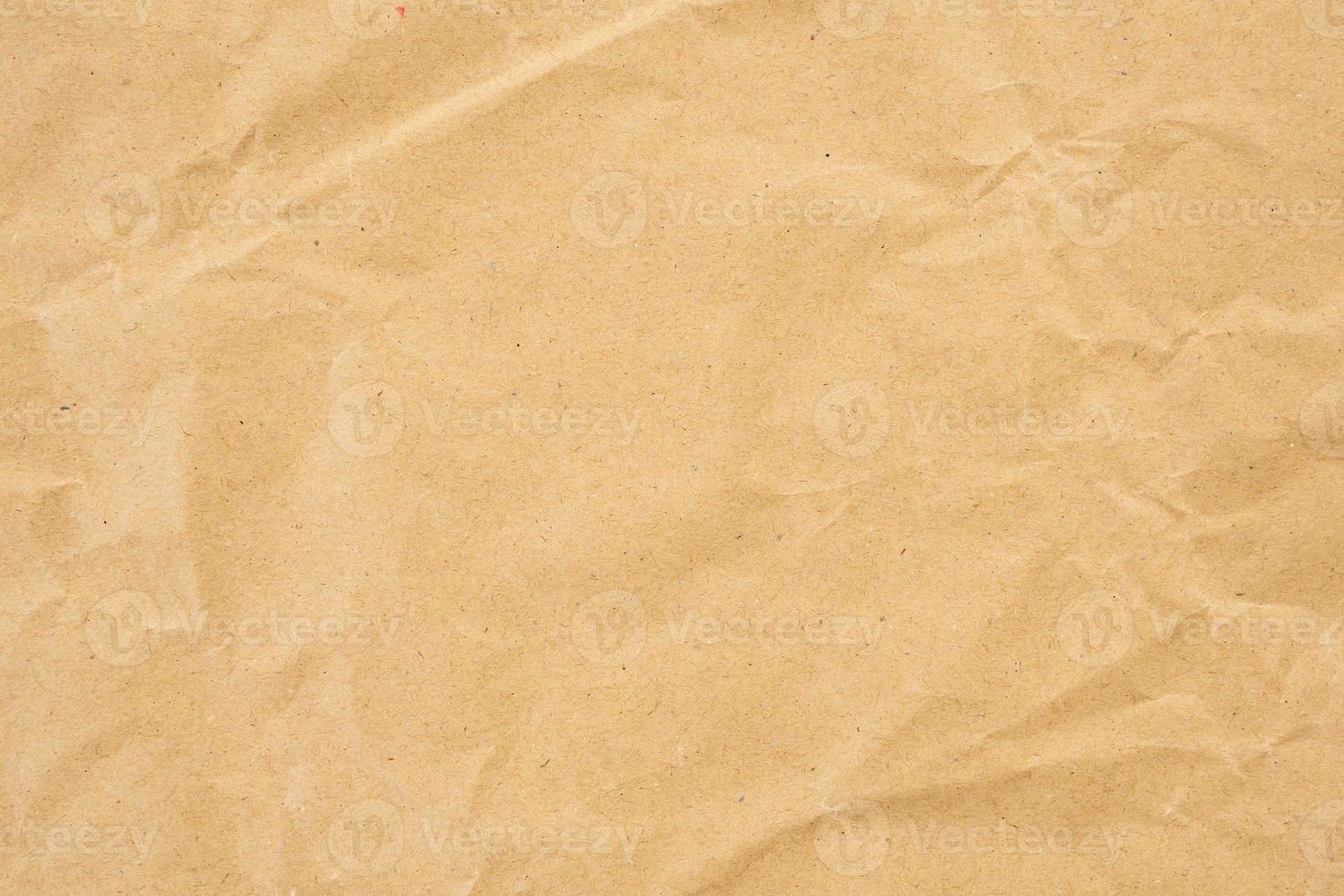 abstrakt brun skrynkliga skrynkligt återvinna papper textur bakgrund foto