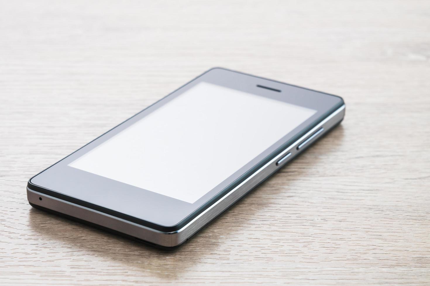 smartphone på vit bakgrund foto