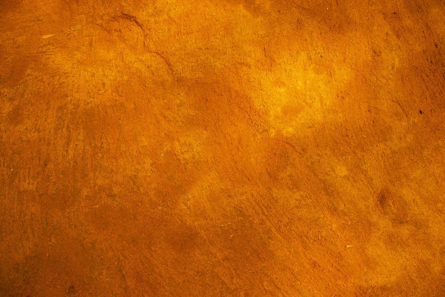 orange smutsig jord golv grunge abstrakt textur bakgrund tapet foto