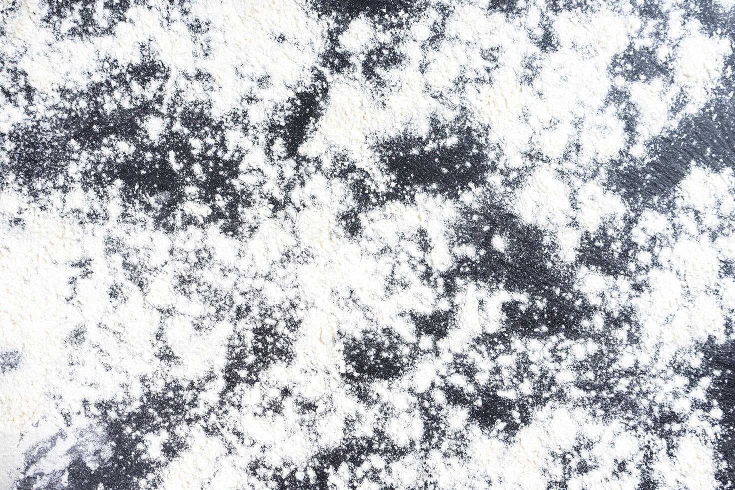 abstrakt bakgrund av mjölat svart skiffer yta. topp se, platt lägga. foto