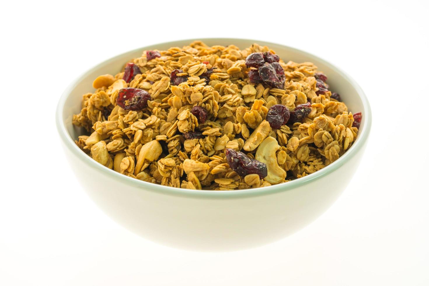 granola i en vit skål foto