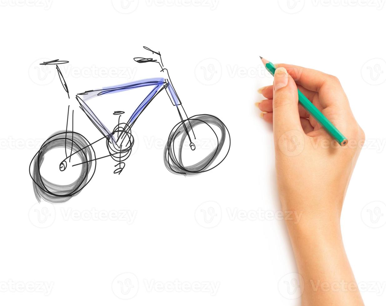 kvinnas hand drar en cykel foto