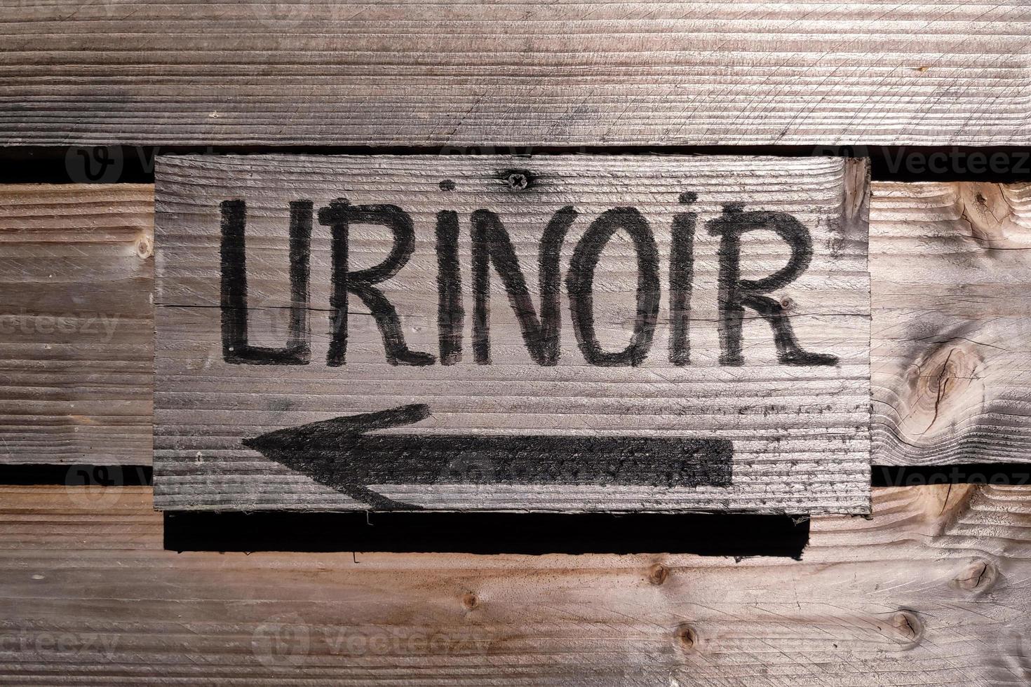 trä- urinoar tecken i franska foto
