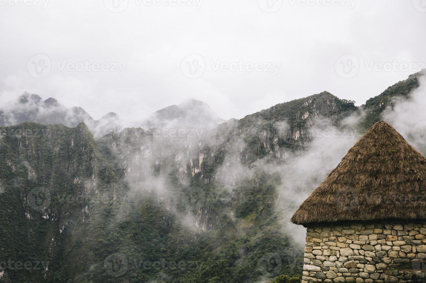 stenigt hus vid machu picchu, peru foto