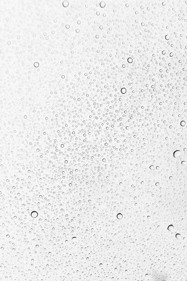 regndroppar på en glasbakgrund foto