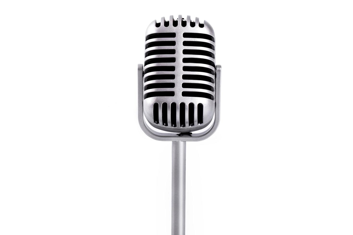 retro mikrofon isolerad på en vit bakgrund foto