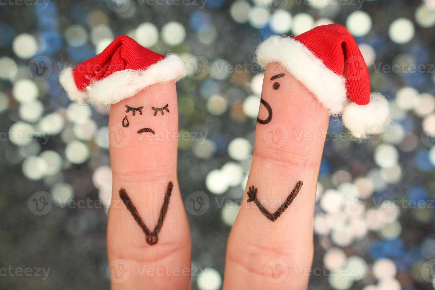 fingrar konst av par firar jul. begrepp av man och kvinna under gräl i ny år. foto