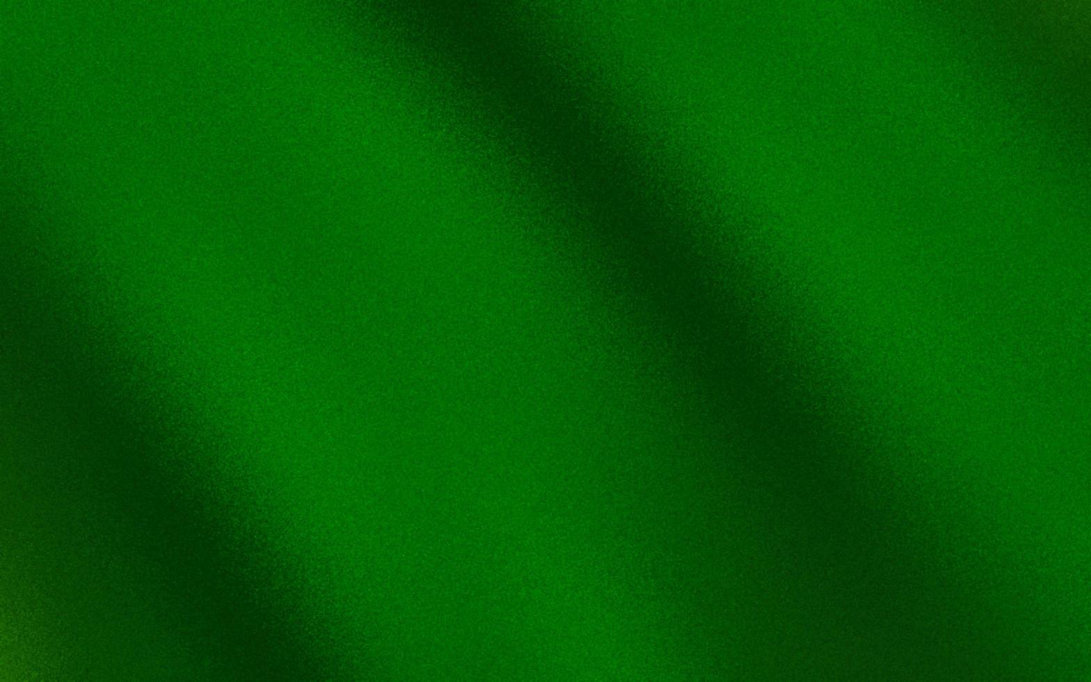 attraktiv grön lutning bakgrund med ljud eller spannmål texturer. grön grunge textur bakgrund. suddig lutning bakgrund. sprutas lutning med de spannmål eller ljud effekter. foto