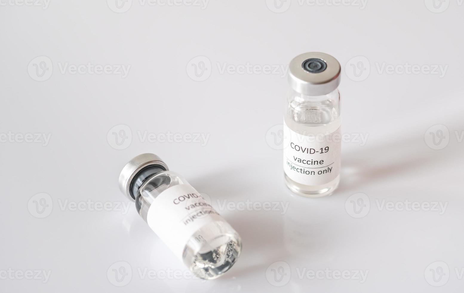 vaccinflaskor mot coronavirus foto