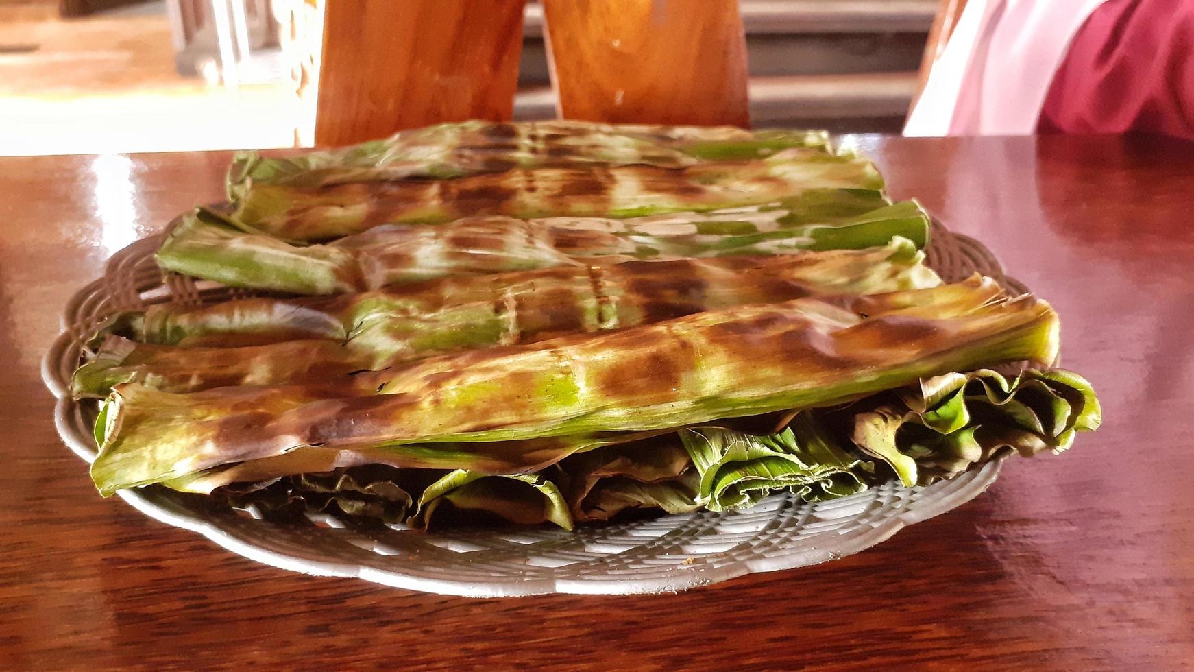 otak otak. grillad fisk kaka skiften från betawi, jakarta. foto