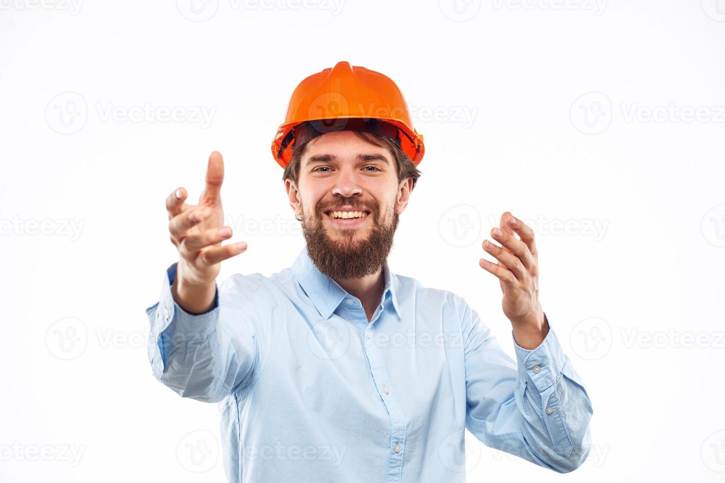 emotionell man i orange måla konstruktion industri arbete livsstil foto