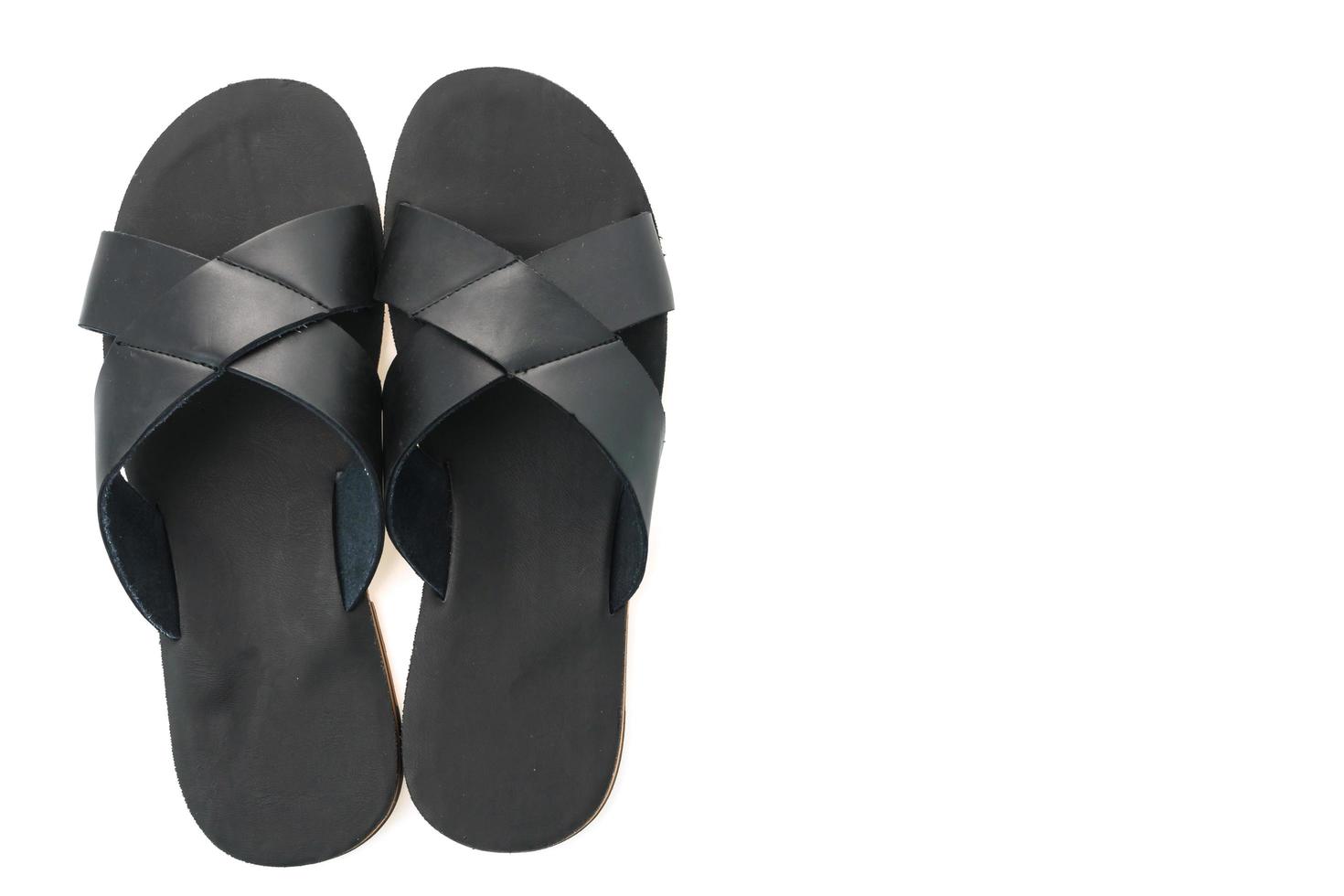 män läder sandal och flip flop skor foto