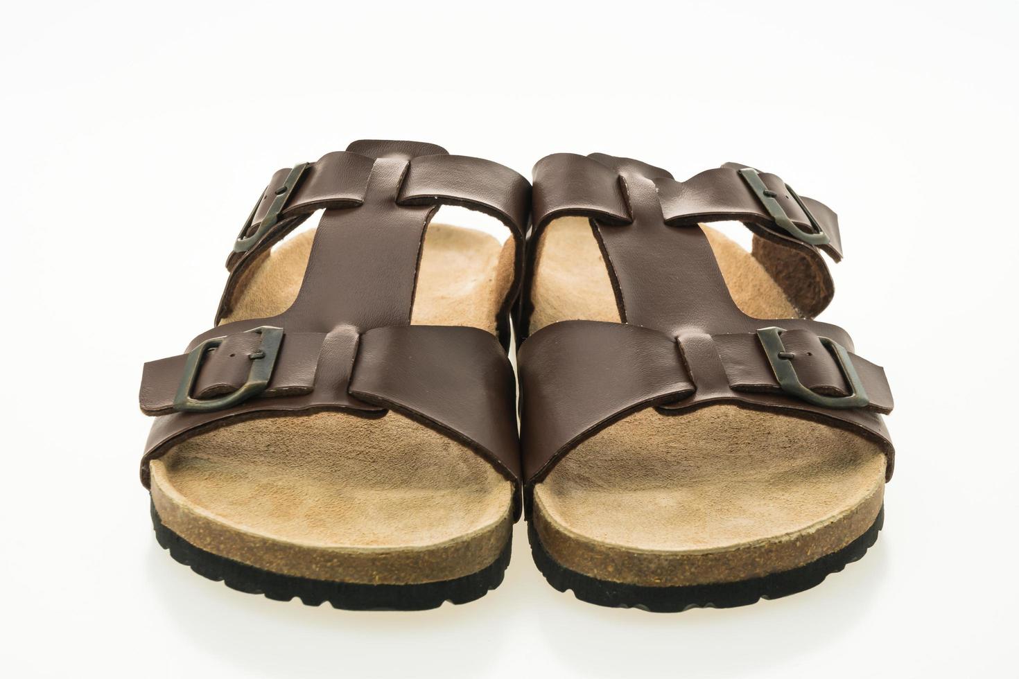 män läder sandal och flip flop skor foto